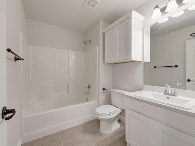 full bathroom featuring toilet, tile patterned floors, bathing tub / shower combination, and vanity