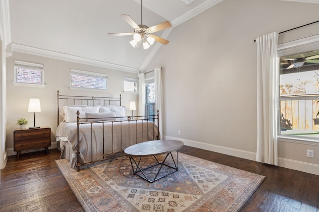 bedroom featuring ceiling fan, dark wood-type flooring, crown molding, and vaulted ceiling