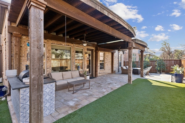 view of patio featuring ceiling fan and an outdoor hangout area