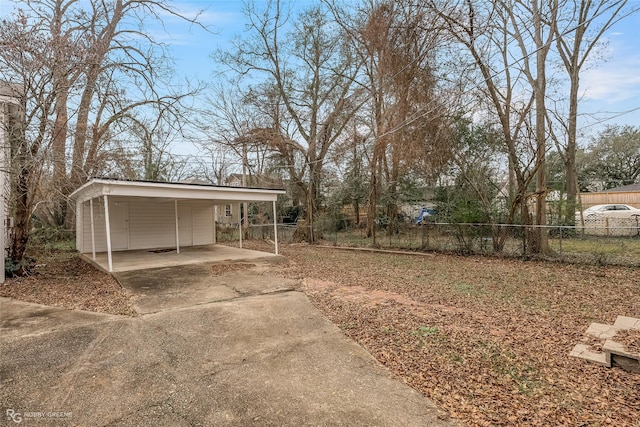 view of yard featuring a carport