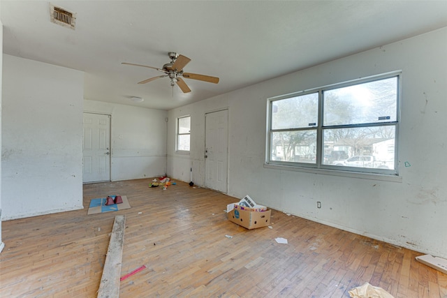 entrance foyer featuring ceiling fan, light hardwood / wood-style floors, and plenty of natural light