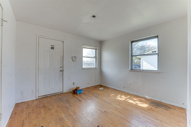 entrance foyer with light hardwood / wood-style flooring