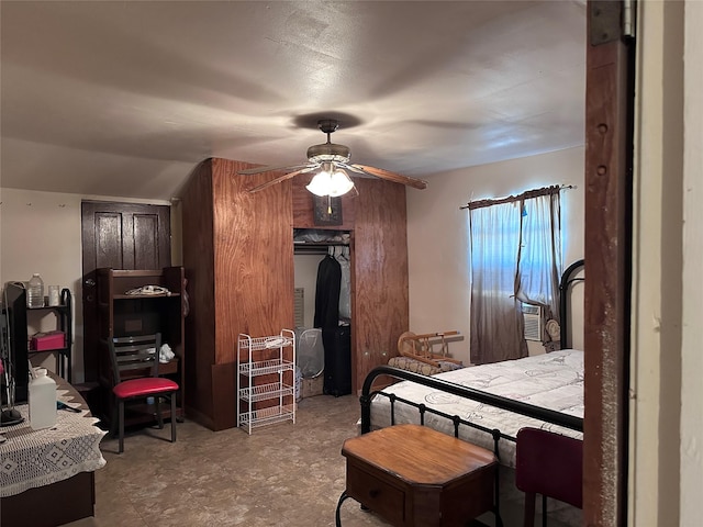 bedroom featuring vaulted ceiling, ceiling fan, and a closet