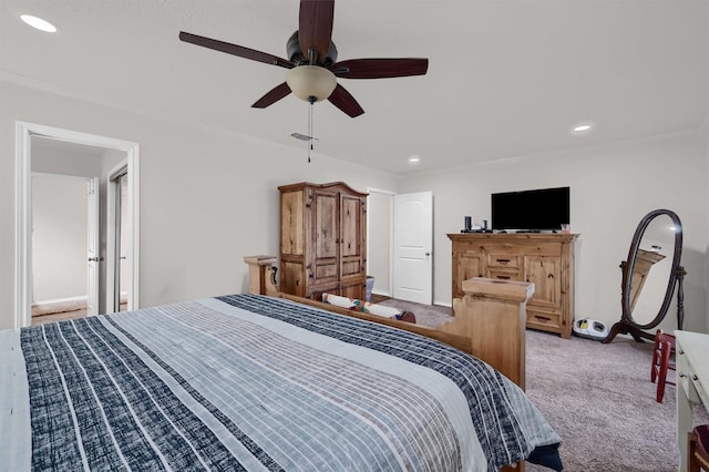 bedroom featuring light carpet and ceiling fan