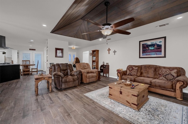 living room with french doors, hardwood / wood-style floors, ceiling fan, and wood ceiling