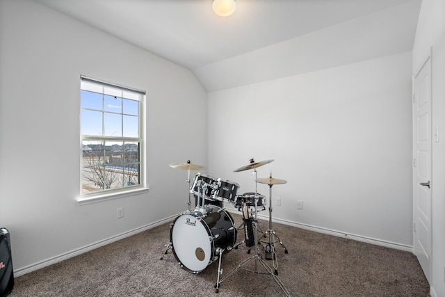 interior space with lofted ceiling and carpet