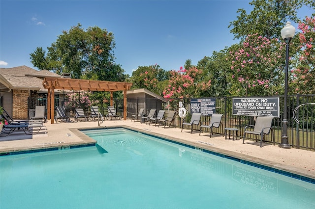 view of pool with a pergola