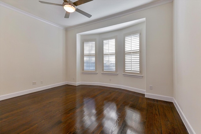 unfurnished room with ceiling fan, crown molding, and dark wood-type flooring