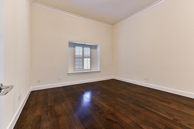 spare room with ornamental molding and hardwood / wood-style floors