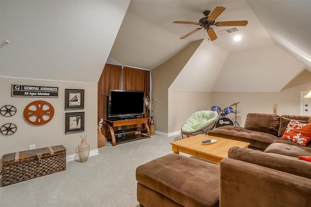 living room with ceiling fan, light colored carpet, and vaulted ceiling