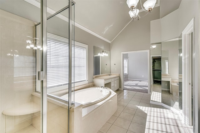 bathroom featuring plus walk in shower, tile patterned flooring, crown molding, and a chandelier