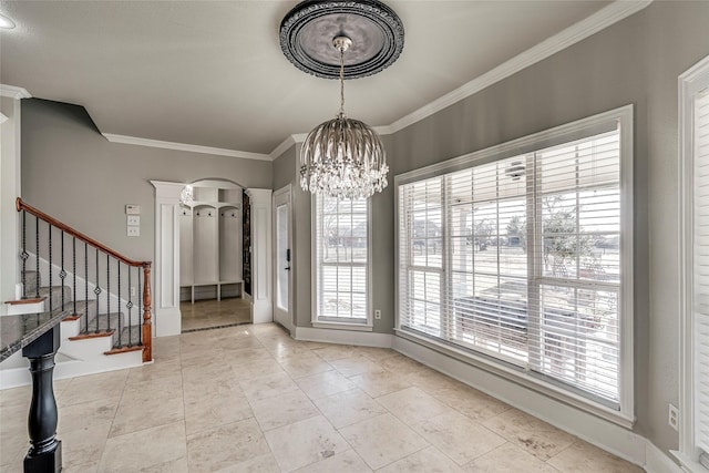 unfurnished dining area with ornate columns, an inviting chandelier, light tile patterned floors, and crown molding