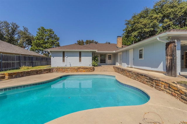 view of pool featuring a patio