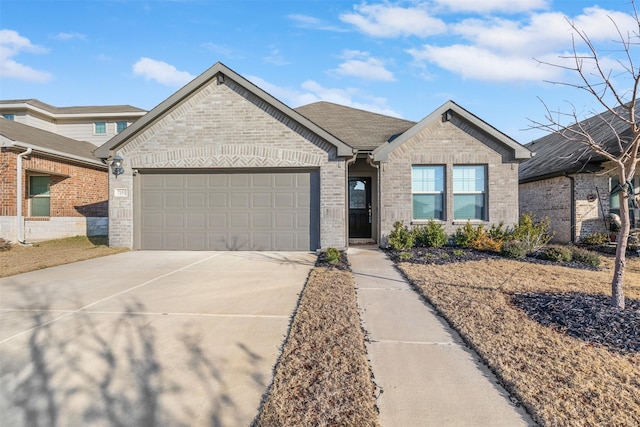 single story home featuring a garage