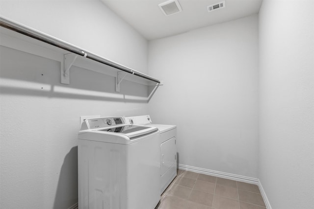 laundry area with washer and dryer