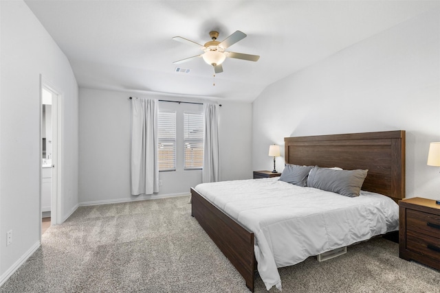 bedroom with ceiling fan, light colored carpet, and lofted ceiling