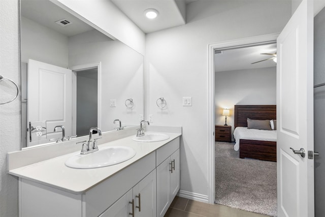 bathroom with vanity and ceiling fan