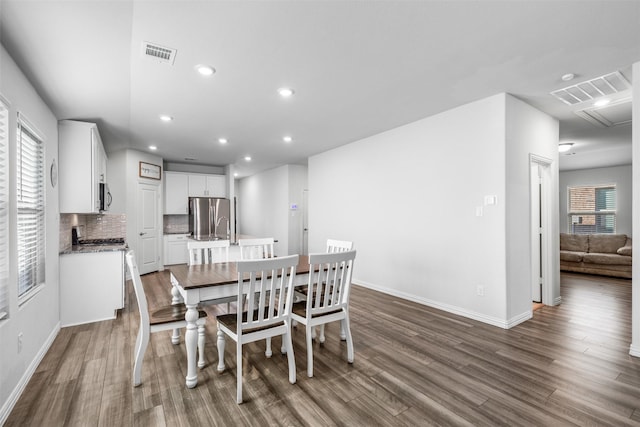 dining area featuring hardwood / wood-style floors