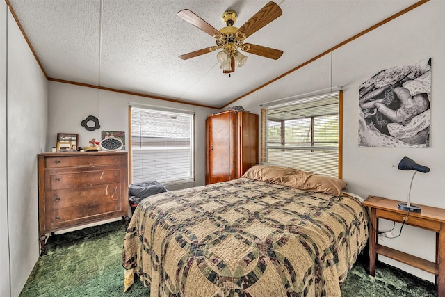 carpeted bedroom featuring vaulted ceiling, a textured ceiling, ceiling fan, and multiple windows