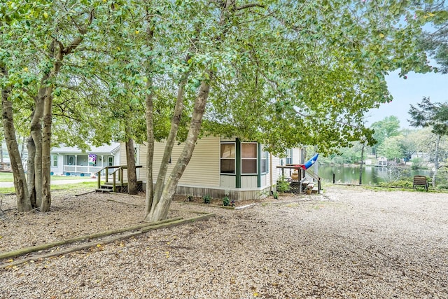 view of yard featuring a water view