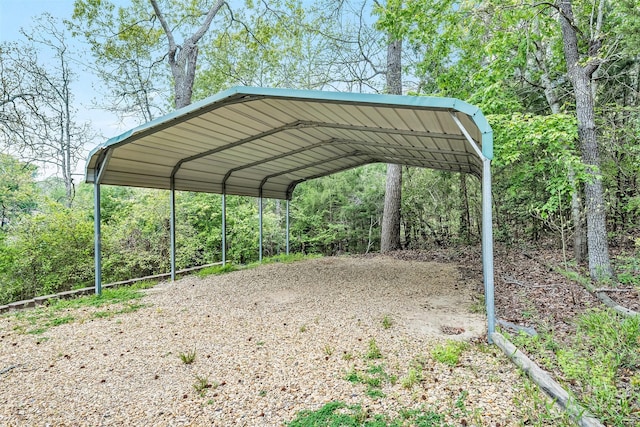 view of parking / parking lot with a carport