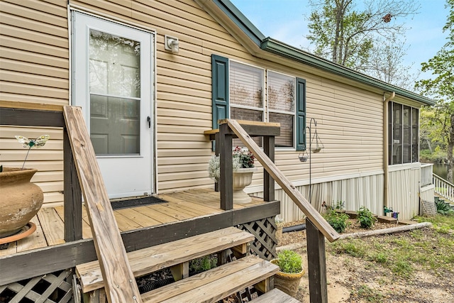 doorway to property featuring a deck