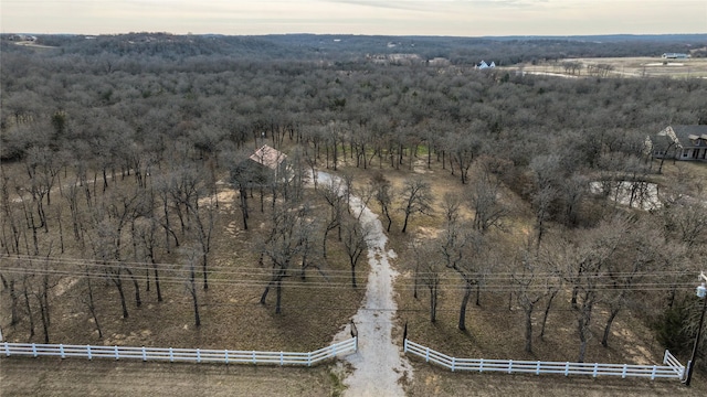 birds eye view of property with a rural view