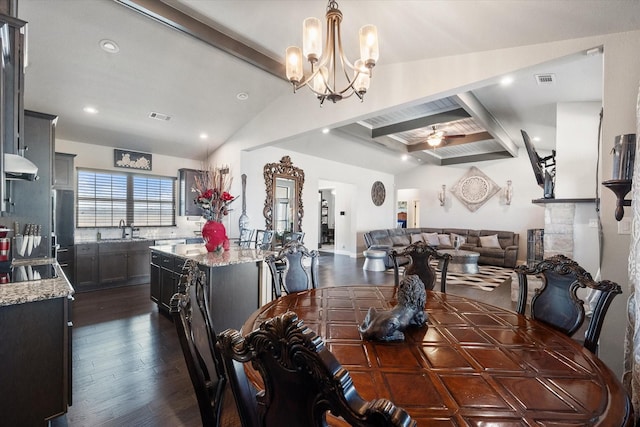 dining space featuring dark wood finished floors, vaulted ceiling with beams, recessed lighting, visible vents, and ceiling fan with notable chandelier