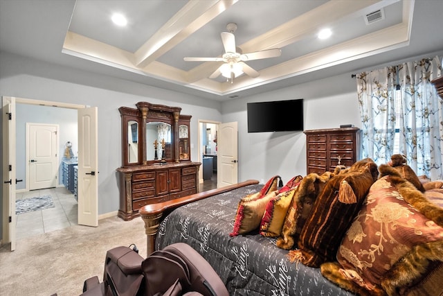 bedroom with baseboards, visible vents, a raised ceiling, light colored carpet, and beamed ceiling