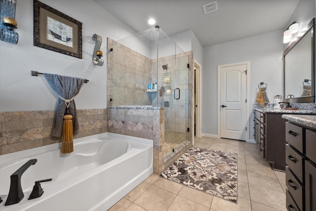 full bathroom with tile patterned floors, visible vents, a shower stall, vanity, and a bath