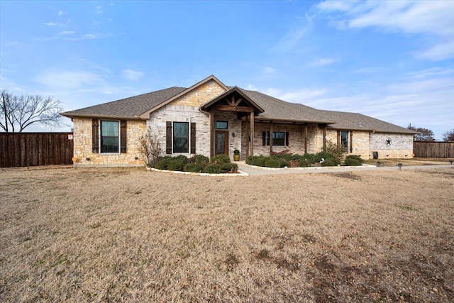 view of front of home with a front lawn