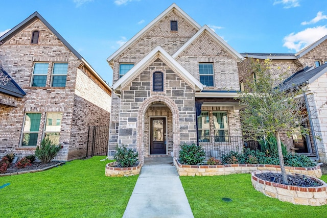 view of front of home featuring a front lawn