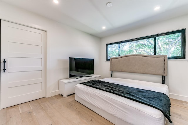 bedroom featuring light wood-type flooring