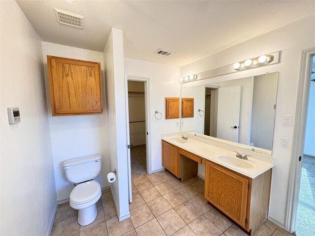 bathroom featuring shower with separate bathtub, tile patterned floors, and vanity