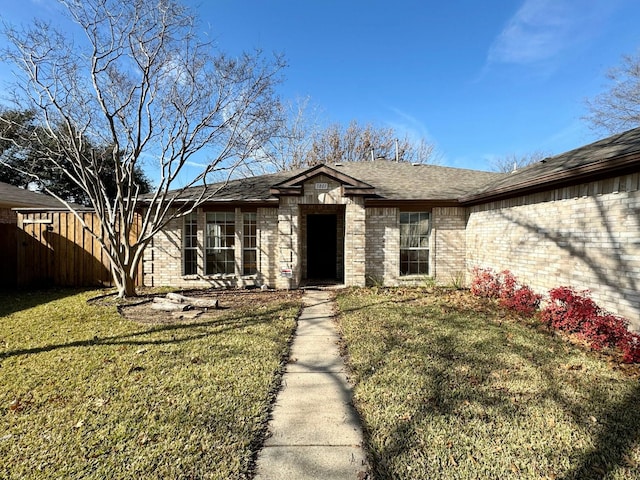 exterior space featuring a front lawn