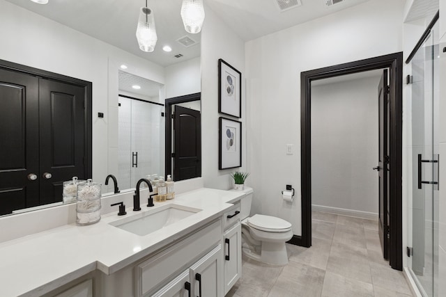 bathroom featuring walk in shower, vanity, and toilet