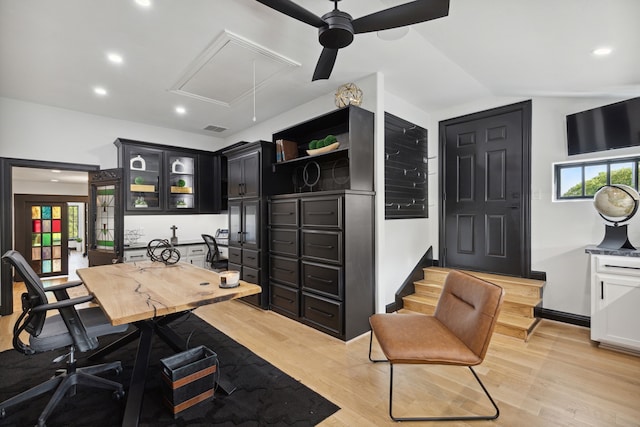 office area featuring ceiling fan, light hardwood / wood-style flooring, and a healthy amount of sunlight