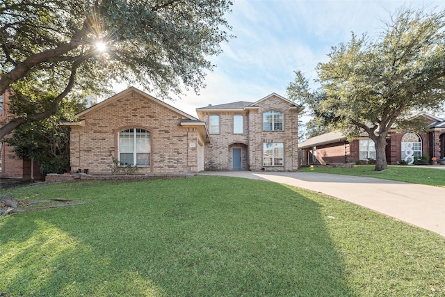 view of front of house with a front lawn