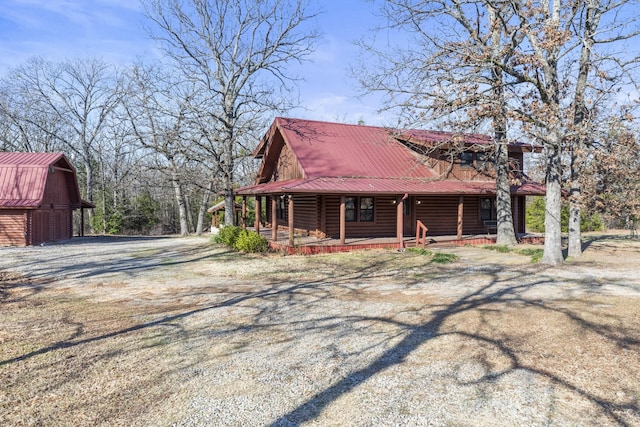 view of home's exterior featuring a porch