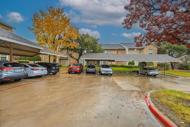 view of parking with a carport