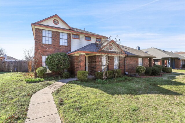 view of front property with a front lawn