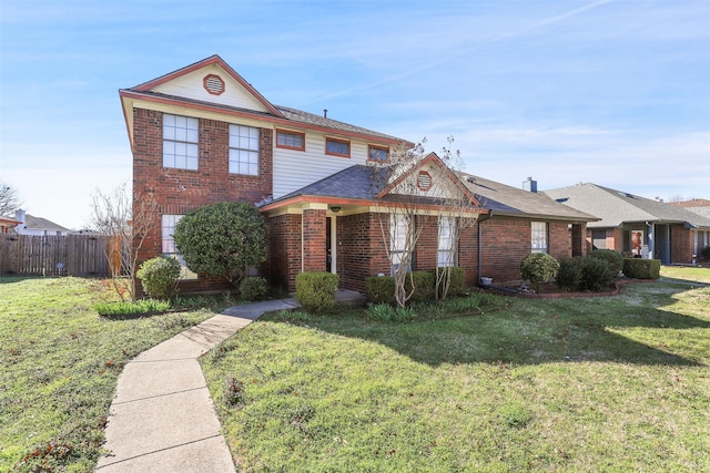 view of front facade with a front yard