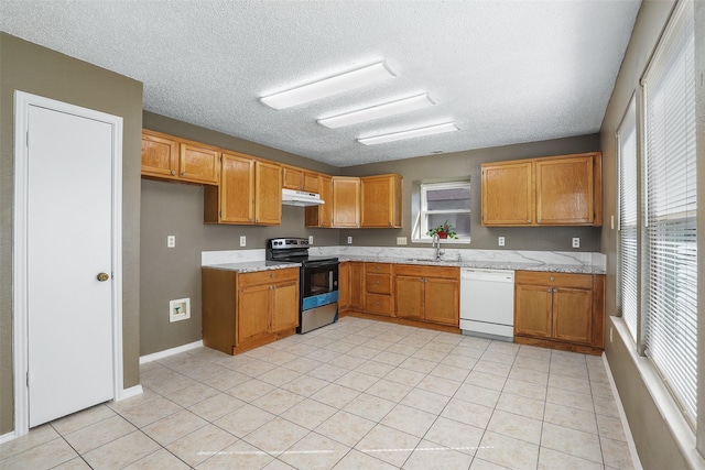 kitchen featuring stainless steel range with electric cooktop, light tile patterned floors, white dishwasher, a textured ceiling, and sink