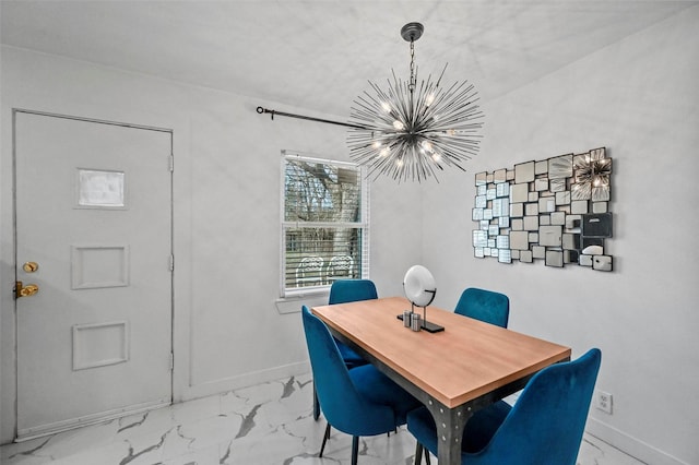 dining space featuring a notable chandelier