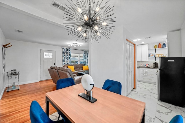 dining room with a chandelier