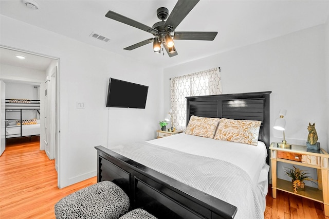 bedroom featuring ceiling fan and wood-type flooring