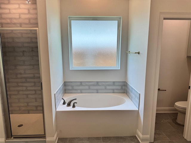 686 Newburyport St, Blanchard, LA 71107 - bathroom featuring a bath, toilet, a shower stall, and tile patterned flooring