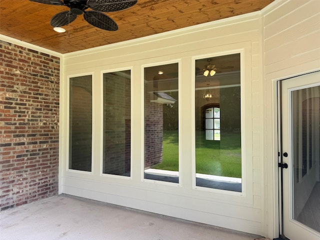 686 Newburyport St, Blanchard, LA 71107 - view of exterior entry featuring ceiling fan, brick siding, and a patio