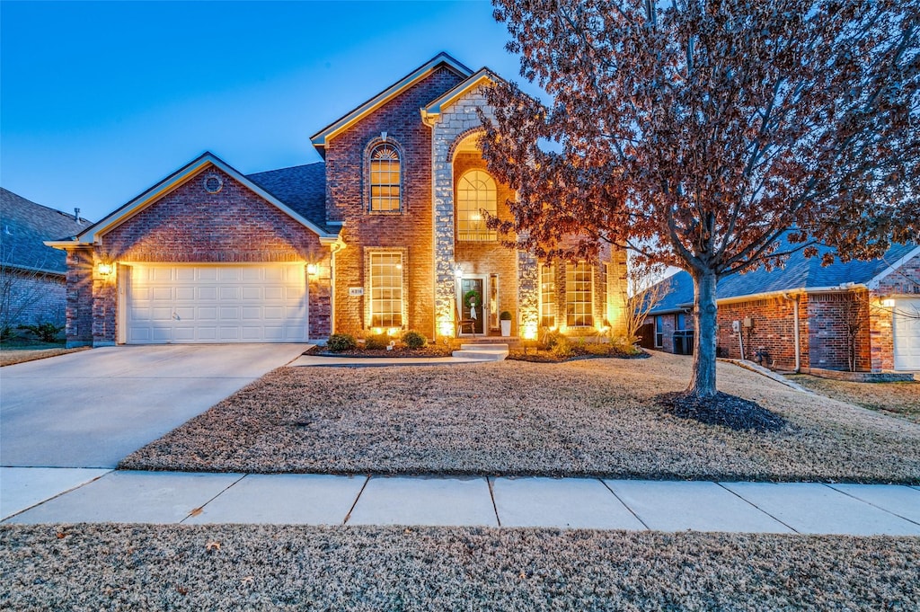 front of property with a garage