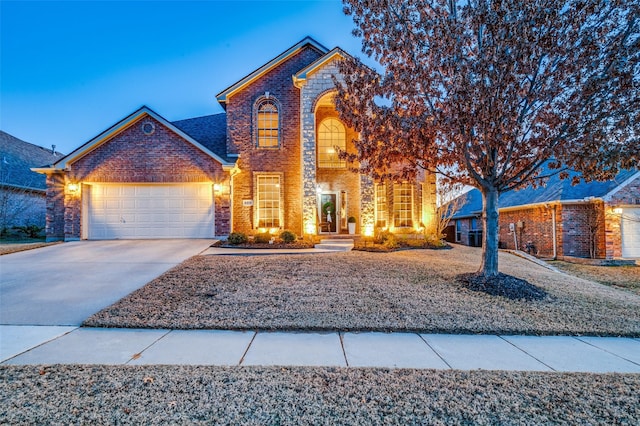 front of property with a garage